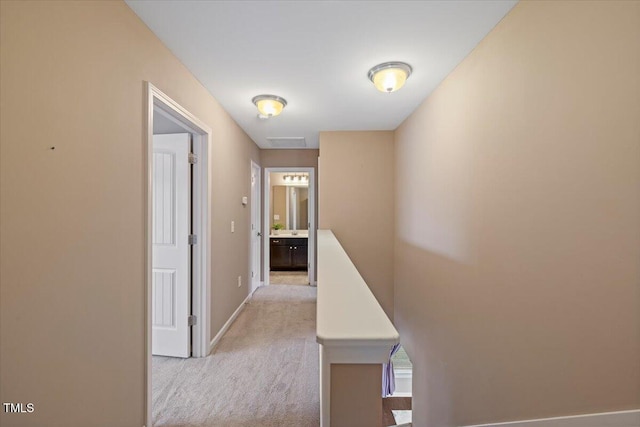 504 Gumview Cir, Fuquay Varina, NC 27526 - hallway featuring light colored carpet and baseboards