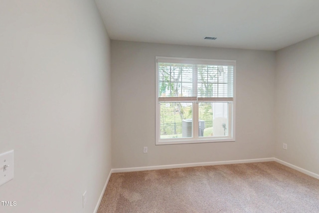 2735 Hunter Woods Dr # 571, Apex, NC 27502 - spare room featuring carpet floors and baseboards