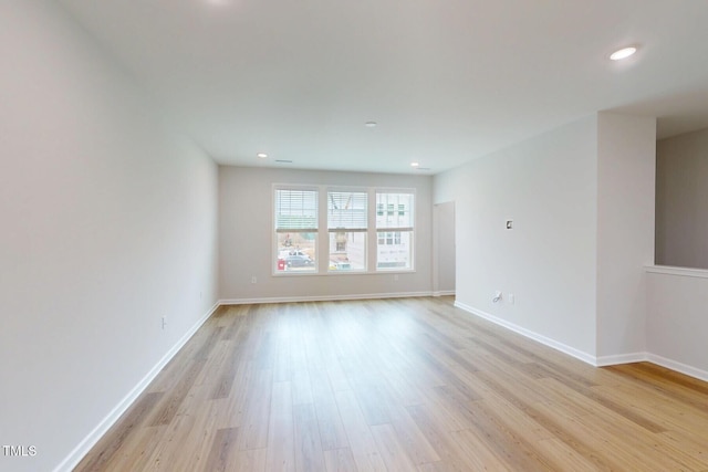 2735 Hunter Woods Dr # 571, Apex, NC 27502 - unfurnished room with light wood-type flooring and recessed lighting
