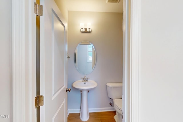 2735 Hunter Woods Dr # 571, Apex, NC 27502 - bathroom featuring toilet and wood finished floors