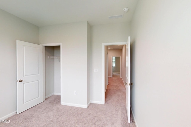 2735 Hunter Woods Dr # 571, Apex, NC 27502 - unfurnished bedroom with light carpet and a closet