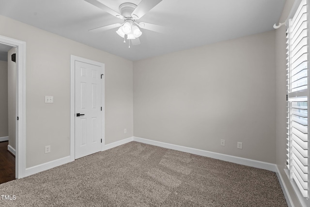 4408 Highmeadow Ln N, Wilson, NC 27896 - unfurnished bedroom featuring carpet flooring and ceiling fan