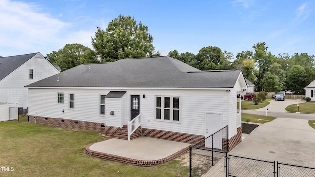 4408 Highmeadow Ln N, Wilson, NC 27896 - back of property with a shingled roof, crawl space, and a gate