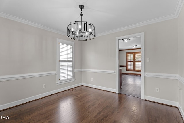 4408 Highmeadow Ln N, Wilson, NC 27896 - empty room featuring a chandelier, dark wood-style flooring, and ornamental molding