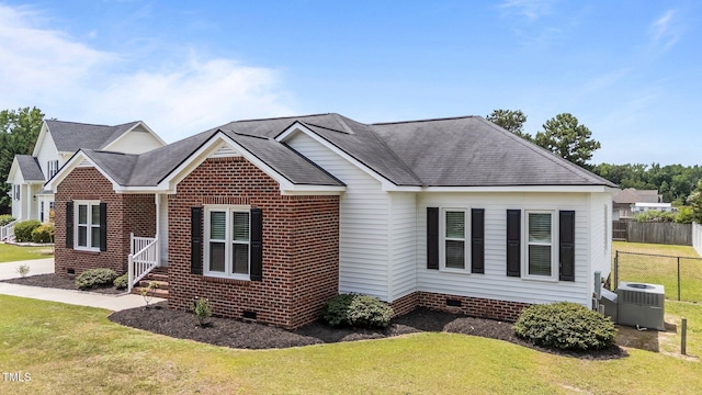 4408 Highmeadow Ln N, Wilson, NC 27896 - view of front facade with crawl space, a shingled roof, and brick siding
