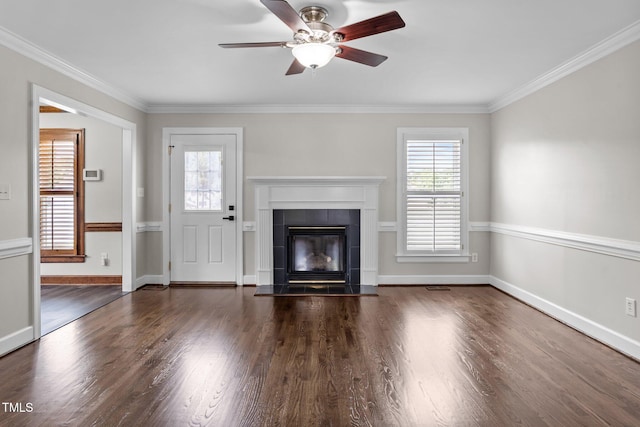 4408 Highmeadow Ln N, Wilson, NC 27896 - unfurnished living room featuring healthy amount of natural light, ceiling fan, a fireplace, ornamental molding, and wood finished floors