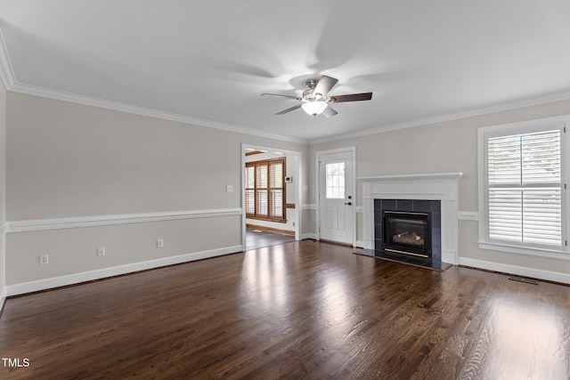4408 Highmeadow Ln N, Wilson, NC 27896 - unfurnished living room featuring ceiling fan, wood finished floors, crown molding, and a tile fireplace