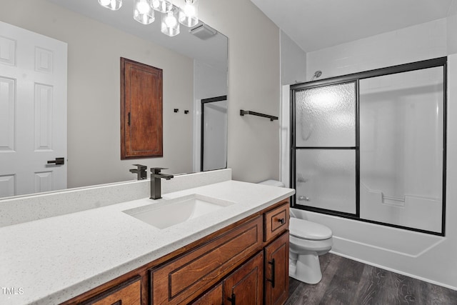4408 Highmeadow Ln N, Wilson, NC 27896 - bathroom with vanity, wood finished floors, and combined bath / shower with glass door