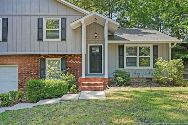 6405 Riegelwood St, Fayetteville, NC 28314 - split level home featuring a front lawn, a garage, roof with shingles, and board and batten siding