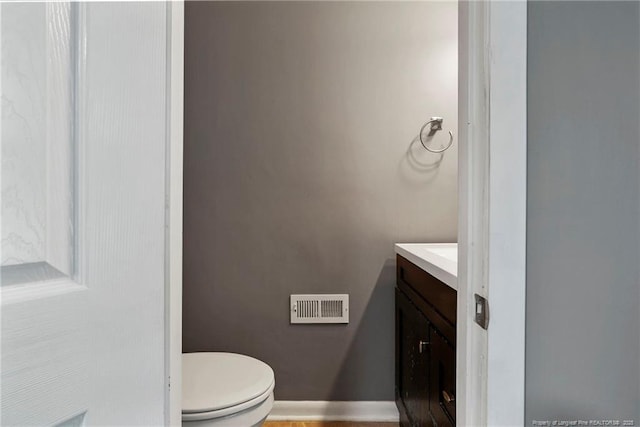 6405 Riegelwood St, Fayetteville, NC 28314 - half bath featuring vanity and toilet