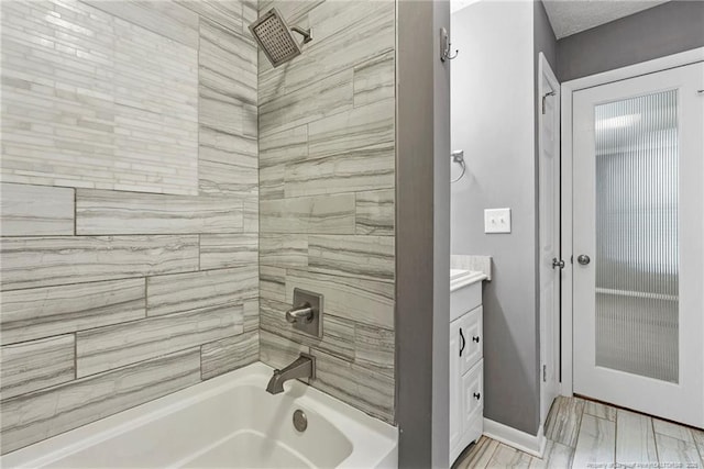 6405 Riegelwood St, Fayetteville, NC 28314 - bathroom featuring shower / tub combination and vanity