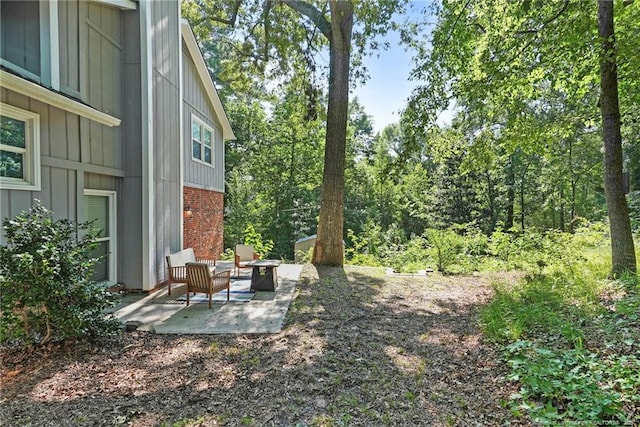 6405 Riegelwood St, Fayetteville, NC 28314 - view of yard with a patio area