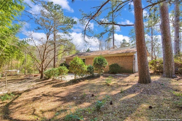 6411 Huntleigh Ct, Fayetteville, NC 28303 - view of home's exterior featuring brick siding