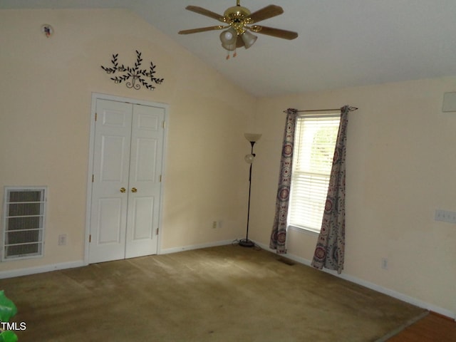 221 Hickory Glen Ln, Durham, NC 27703 - unfurnished bedroom with carpet flooring, lofted ceiling, a closet, and a ceiling fan