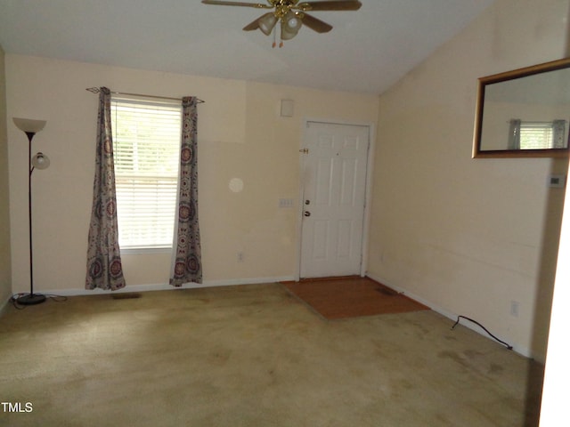 221 Hickory Glen Ln, Durham, NC 27703 - entryway featuring a ceiling fan, vaulted ceiling, and carpet flooring
