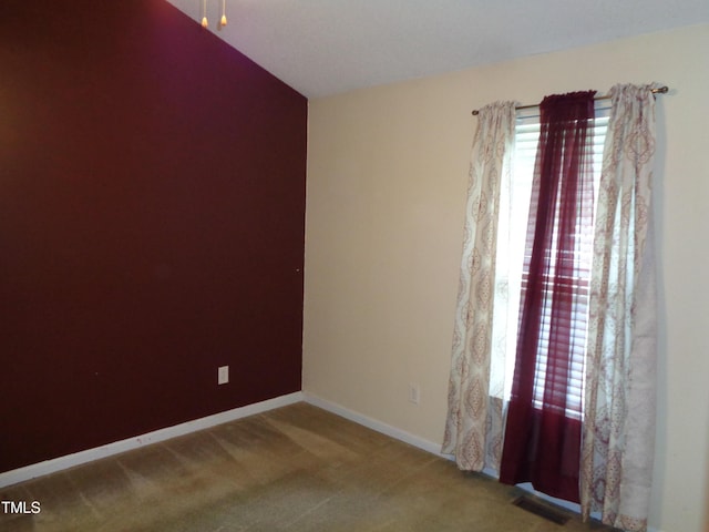 221 Hickory Glen Ln, Durham, NC 27703 - spare room featuring healthy amount of natural light and carpet floors