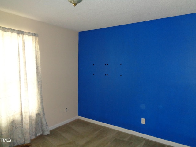 221 Hickory Glen Ln, Durham, NC 27703 - carpeted empty room featuring baseboards