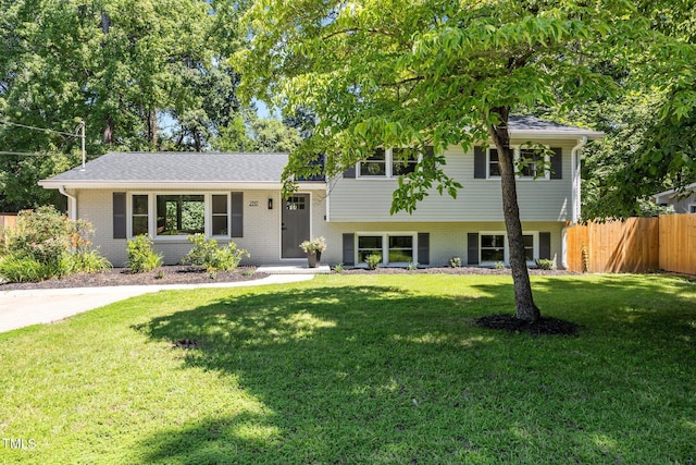 2317 Bertie Dr, Raleigh, NC 27610 - split level home featuring brick siding