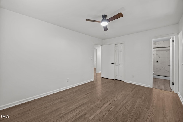 2317 Bertie Dr, Raleigh, NC 27610 - unfurnished bedroom with wood finished floors, a closet, connected bathroom, and a ceiling fan