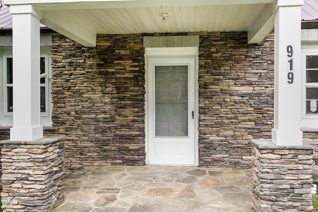 919 Chester St, Durham, NC 27701 - entrance to property featuring stone siding and a porch