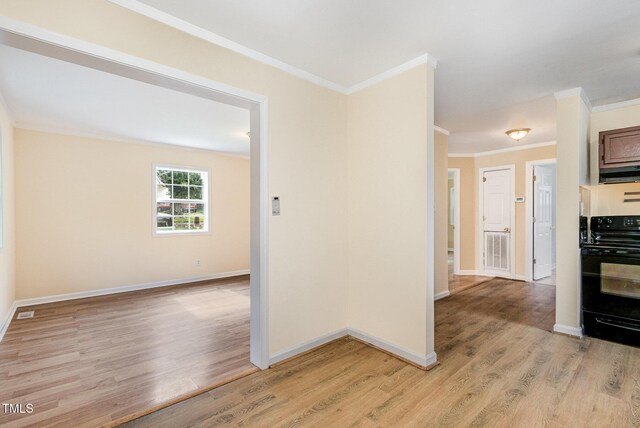 919 Chester St, Durham, NC 27701 - kitchen featuring crown molding, light wood finished floors, and wall oven