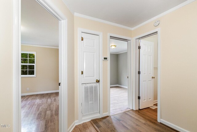 919 Chester St, Durham, NC 27701 - hallway with wood finished floors and crown molding
