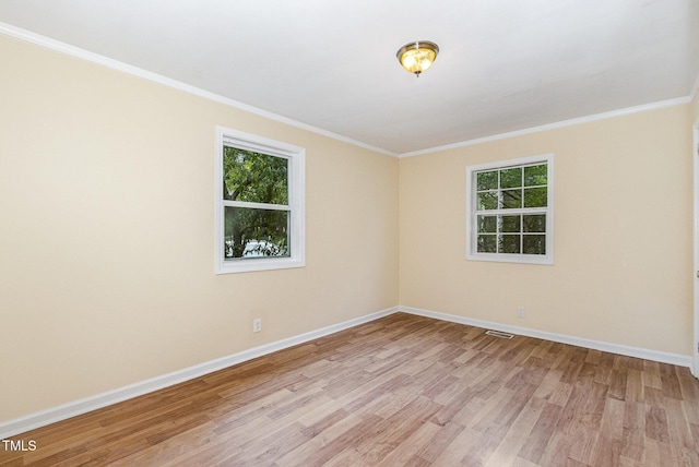 919 Chester St, Durham, NC 27701 - unfurnished room featuring light wood-style flooring and ornamental molding