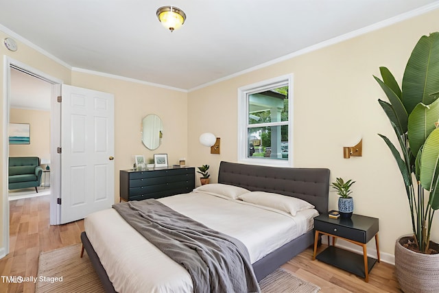 919 Chester St, Durham, NC 27701 - bedroom with light wood-style floors and ornamental molding