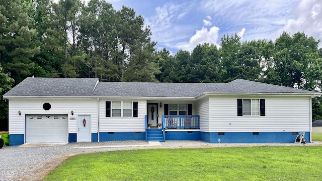 469 Whitehead Rd, Enfield, NC 27823 - view of front of home with crawl space, a porch, an attached garage, a front lawn, and driveway