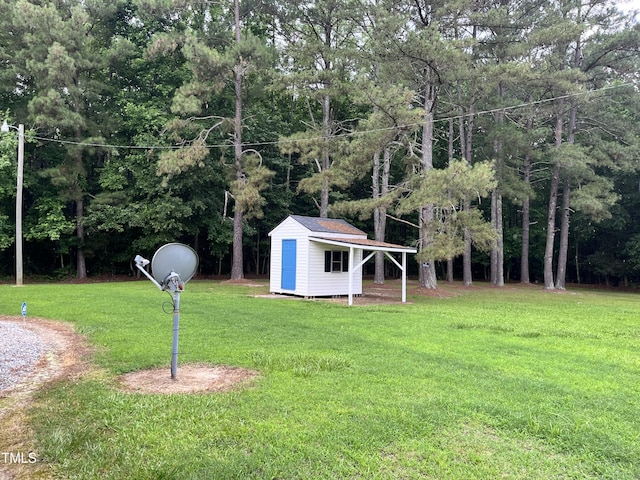 469 Whitehead Rd, Enfield, NC 27823 - view of green lawn featuring a storage shed
