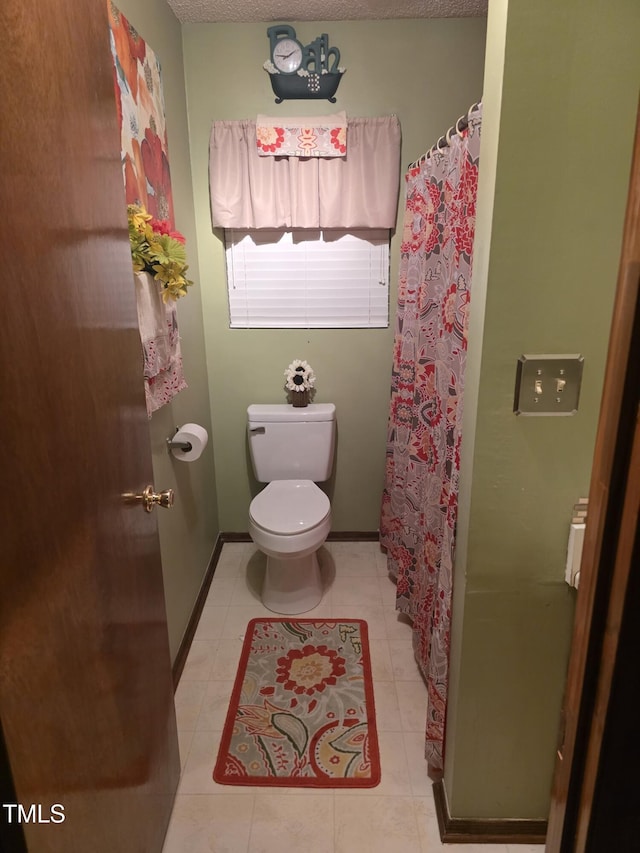 469 Whitehead Rd, Enfield, NC 27823 - full bath featuring curtained shower and tile patterned floors