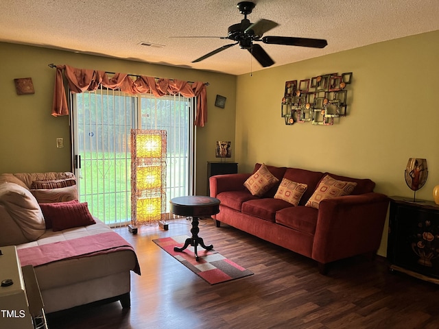 469 Whitehead Rd, Enfield, NC 27823 - living area with wood finished floors, a textured ceiling, and ceiling fan