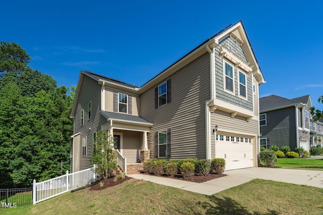 304 Garden Walk Dr, Durham, NC 27703 - view of front of house with a garage and driveway