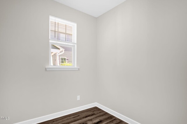 304 Garden Walk Dr, Durham, NC 27703 - spare room featuring healthy amount of natural light and dark wood-style floors