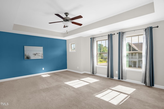 304 Garden Walk Dr, Durham, NC 27703 - unfurnished room featuring a raised ceiling, carpet, and a ceiling fan