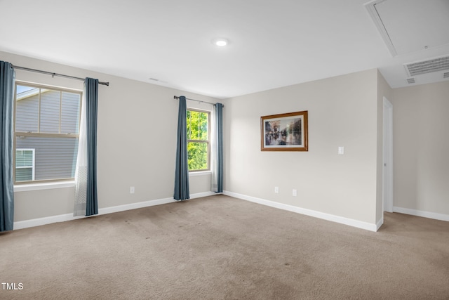 304 Garden Walk Dr, Durham, NC 27703 - spare room with attic access, carpet floors, and recessed lighting