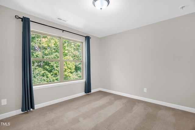 304 Garden Walk Dr, Durham, NC 27703 - carpeted spare room with baseboards