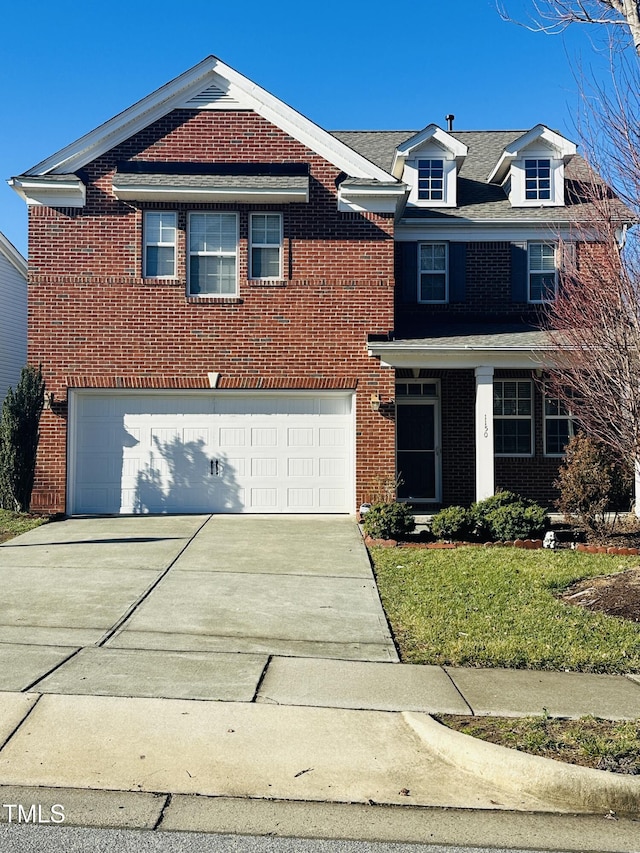 1150 Brookhill Way, Cary, NC 27519 - traditional-style house with a garage, brick siding, and driveway