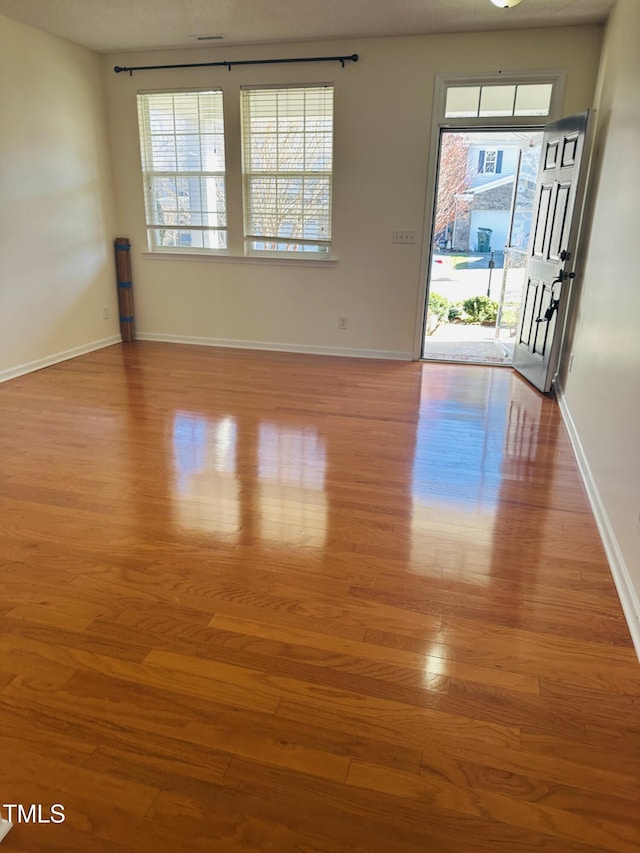 1150 Brookhill Way, Cary, NC 27519 - unfurnished room featuring wood finished floors and baseboards