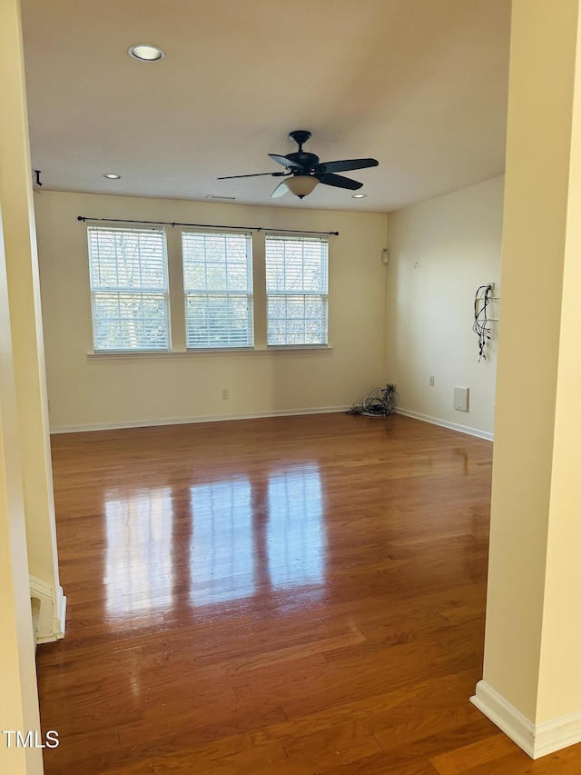 1150 Brookhill Way, Cary, NC 27519 - empty room featuring plenty of natural light, a ceiling fan, wood finished floors, and recessed lighting