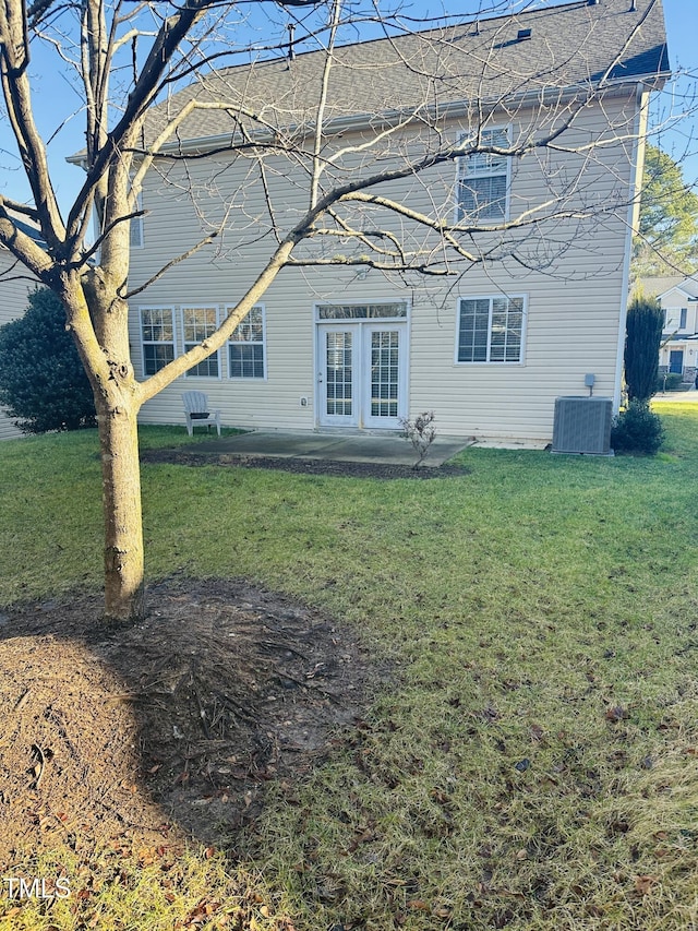 1150 Brookhill Way, Cary, NC 27519 - rear view of property with a yard, a patio area, and a shingled roof