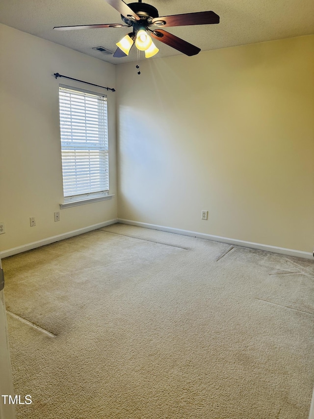 1150 Brookhill Way, Cary, NC 27519 - carpeted empty room with a ceiling fan and a textured ceiling