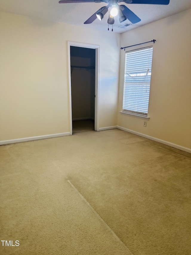 1150 Brookhill Way, Cary, NC 27519 - unfurnished bedroom featuring carpet floors, a closet, and ceiling fan