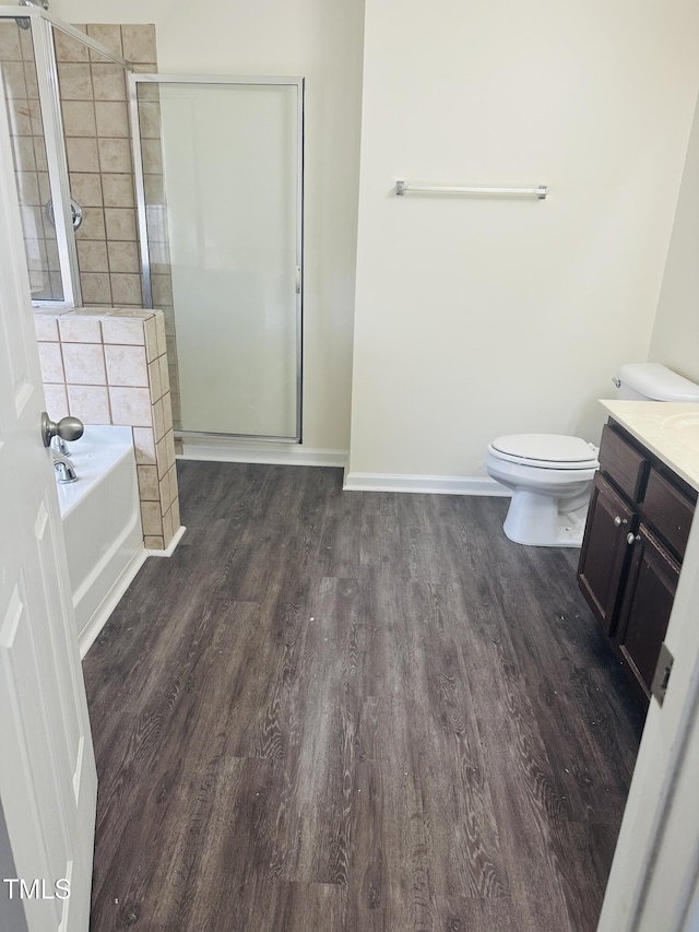 1150 Brookhill Way, Cary, NC 27519 - bathroom featuring wood finished floors, vanity, a bath, and a stall shower
