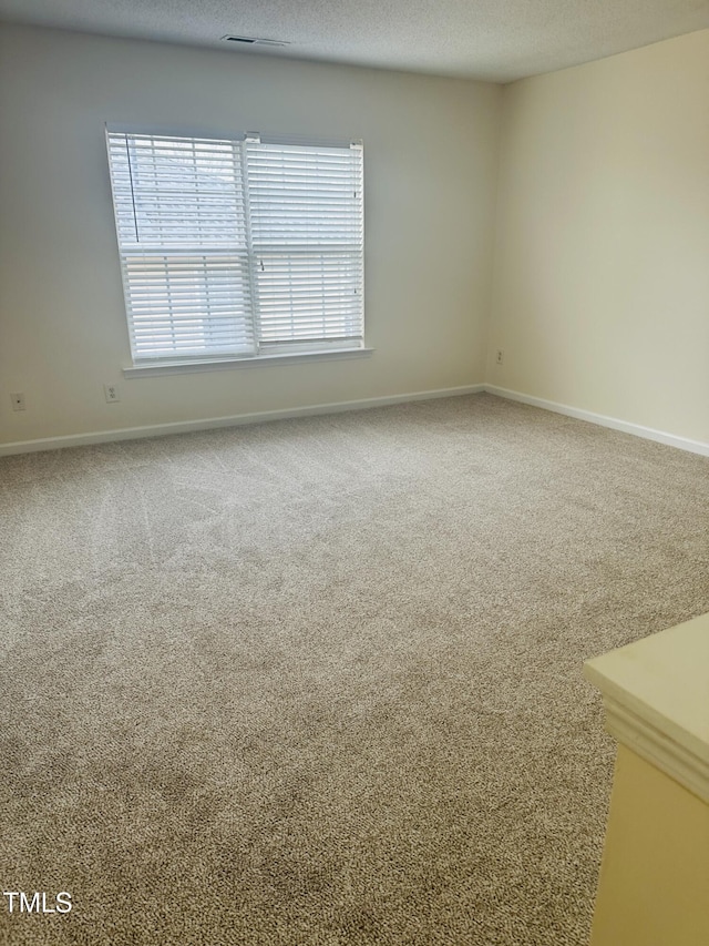 1150 Brookhill Way, Cary, NC 27519 - carpeted spare room featuring baseboards