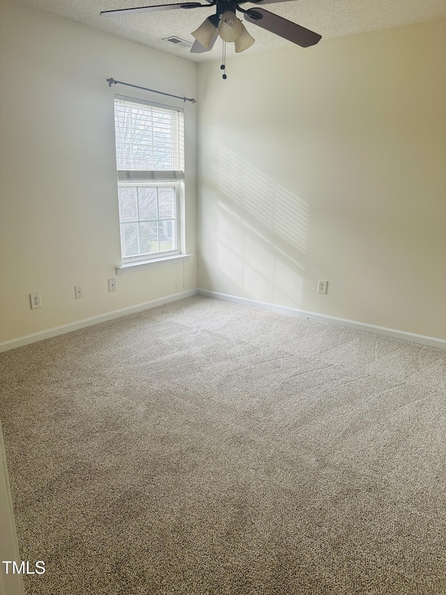 1150 Brookhill Way, Cary, NC 27519 - spare room featuring ceiling fan, carpet floors, and a textured ceiling