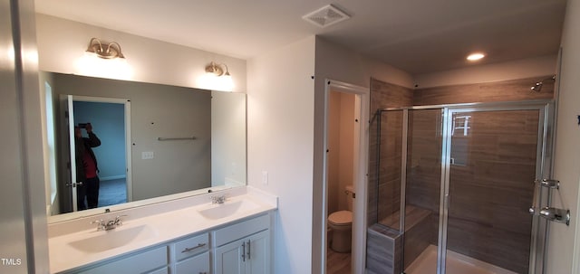 1426 Rosepine Dr, Cary, NC 27519 - full bathroom featuring double vanity, a stall shower, and recessed lighting