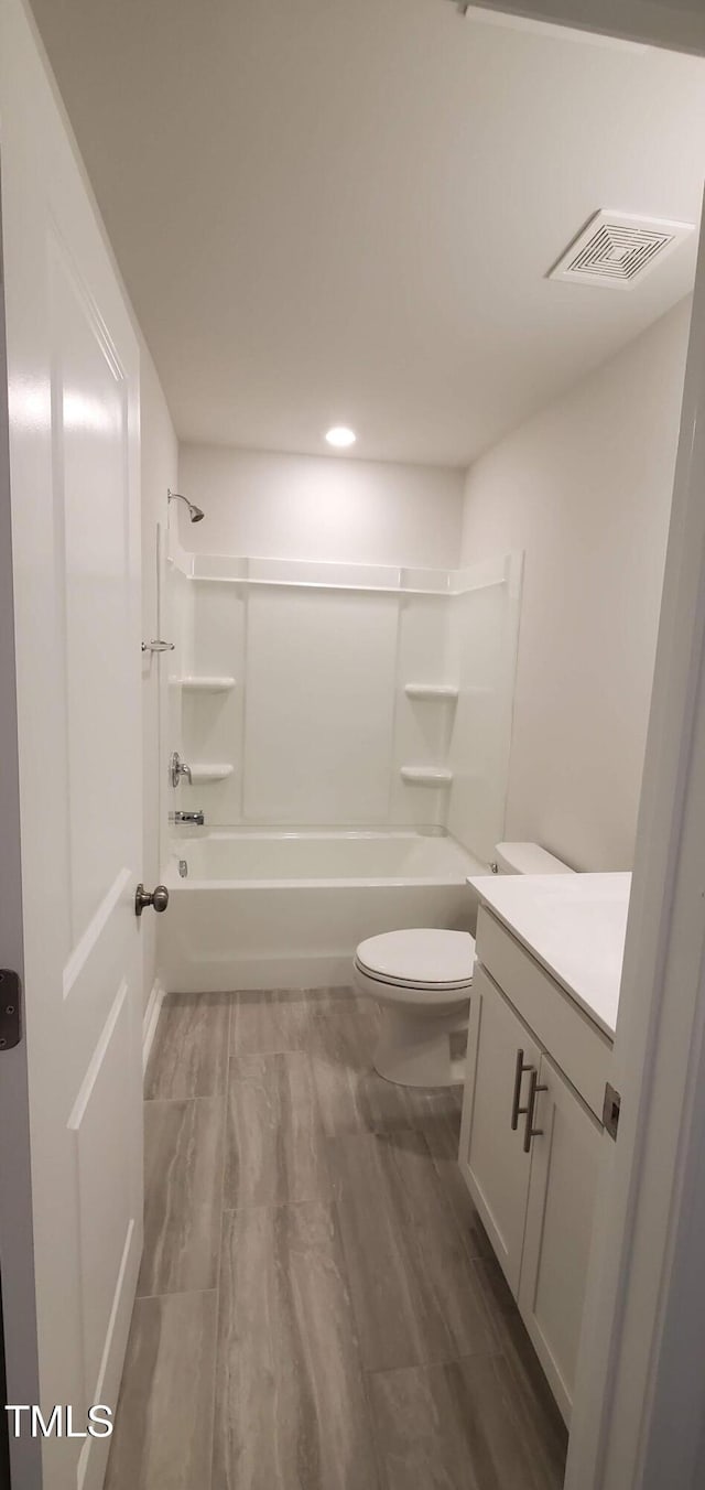 1426 Rosepine Dr, Cary, NC 27519 - full bathroom with vanity, bathing tub / shower combination, recessed lighting, and wood finished floors