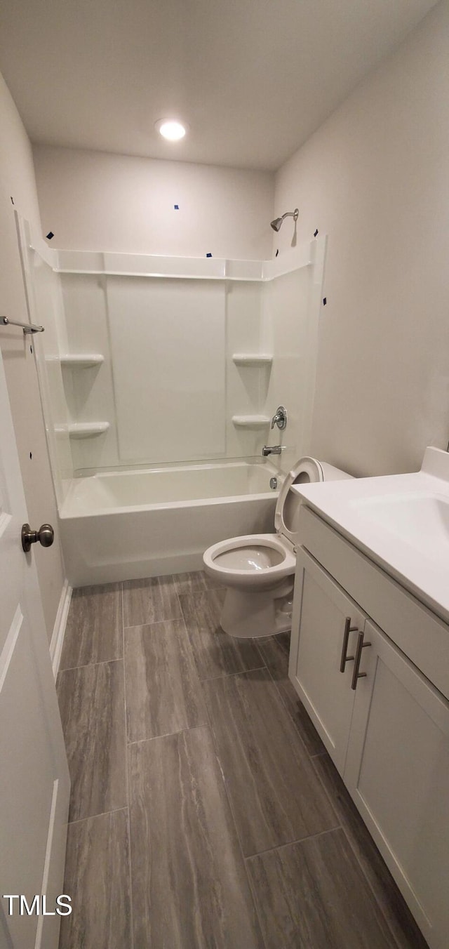 1426 Rosepine Dr, Cary, NC 27519 - full bath with vanity, washtub / shower combination, recessed lighting, and wood finished floors