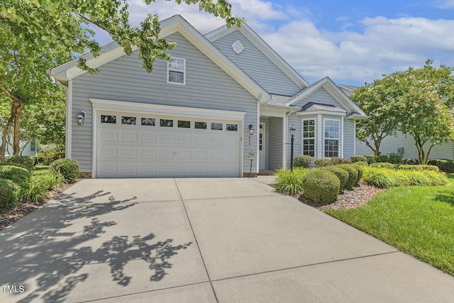 400 Indian Elm Ln, Cary, NC 27519 - view of front of property featuring concrete driveway and an attached garage